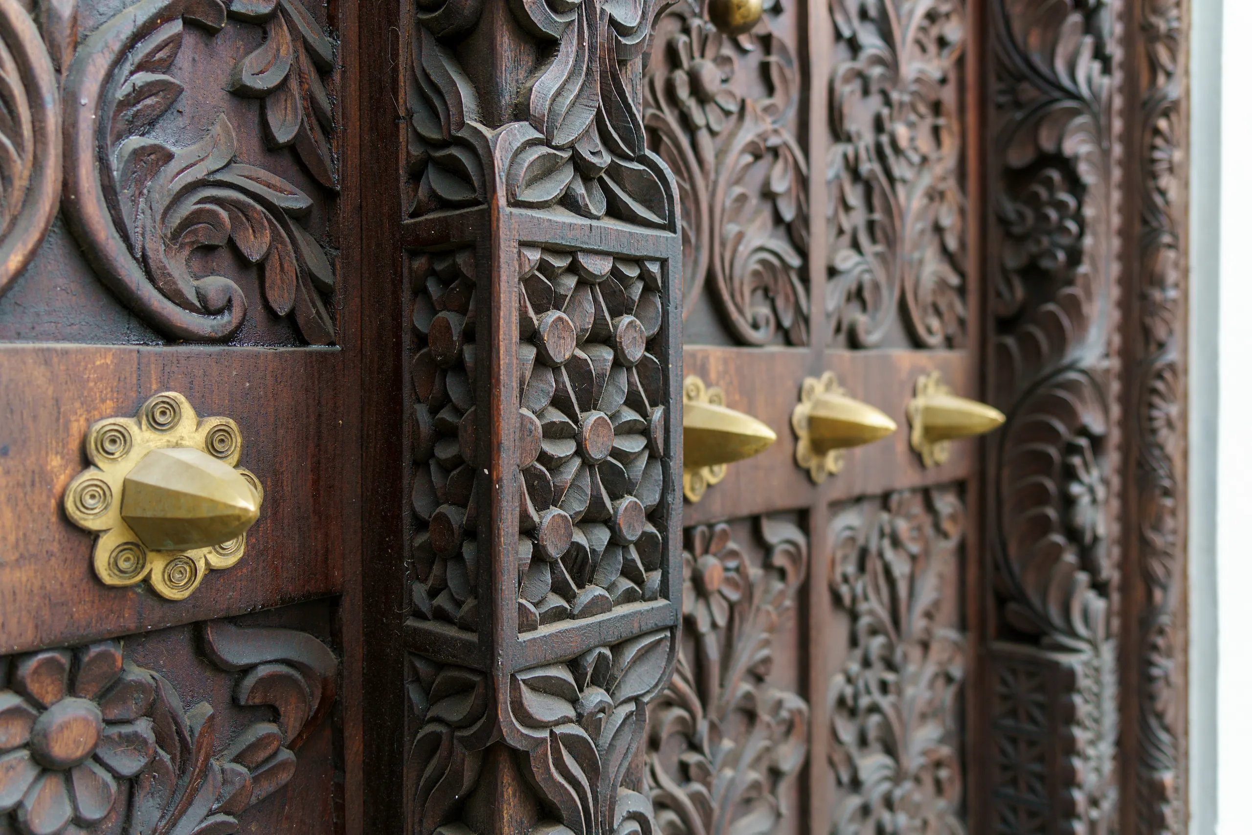 Ornately carved Swahili door in Stone Town, Zanzibar